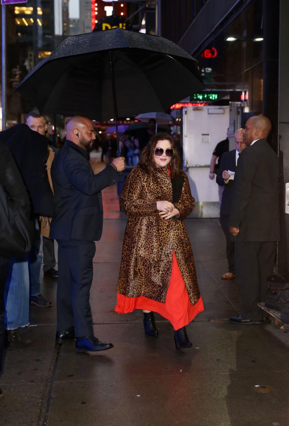 The Academy Award nominated actress, Melissa McCarthy, cozied up in an animal print coat like Edie Sedgwick.