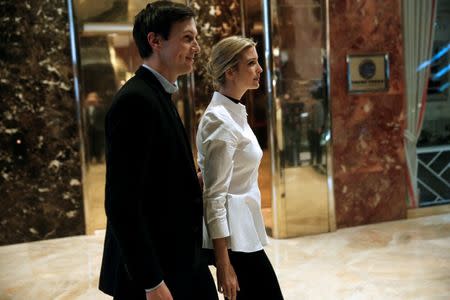 Ivanka Trump, daughter of U.S. President Elect Donald Trump walks through the lobby with her husband Jared Kushner at Trump Tower in New York, U.S. November 18, 2016. REUTERS/Mike Segar