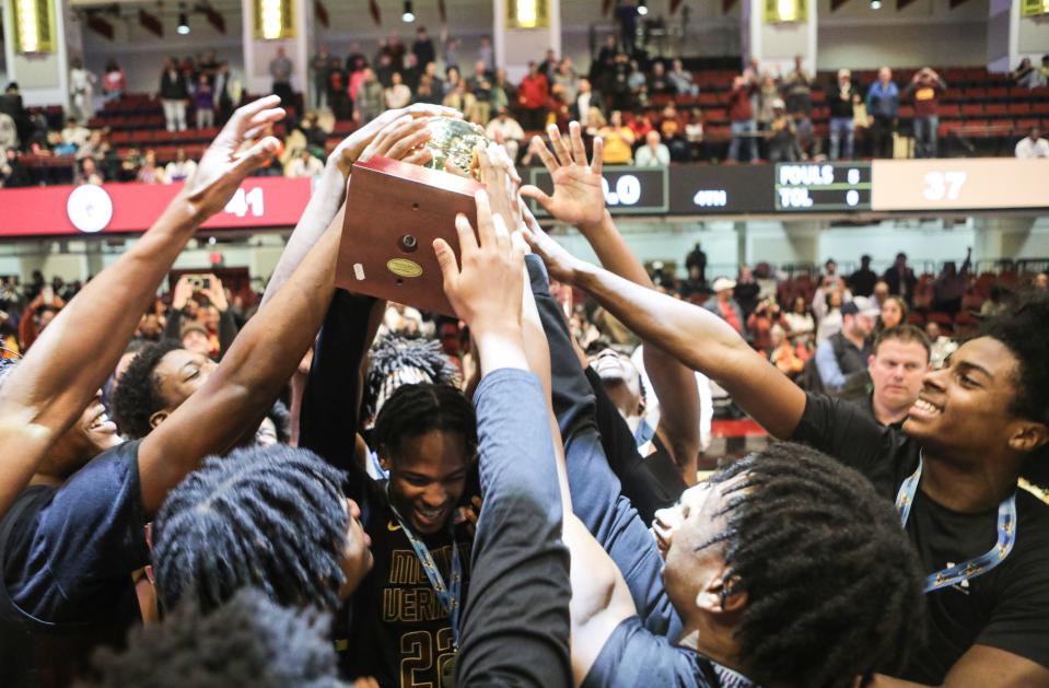 Mount Vernon celebrates after defeating New Rochelle 41-37 to win the section 1 Class AAA Boys Basketball Championship at The Westchester County Center in White Plains March 3, 2024.