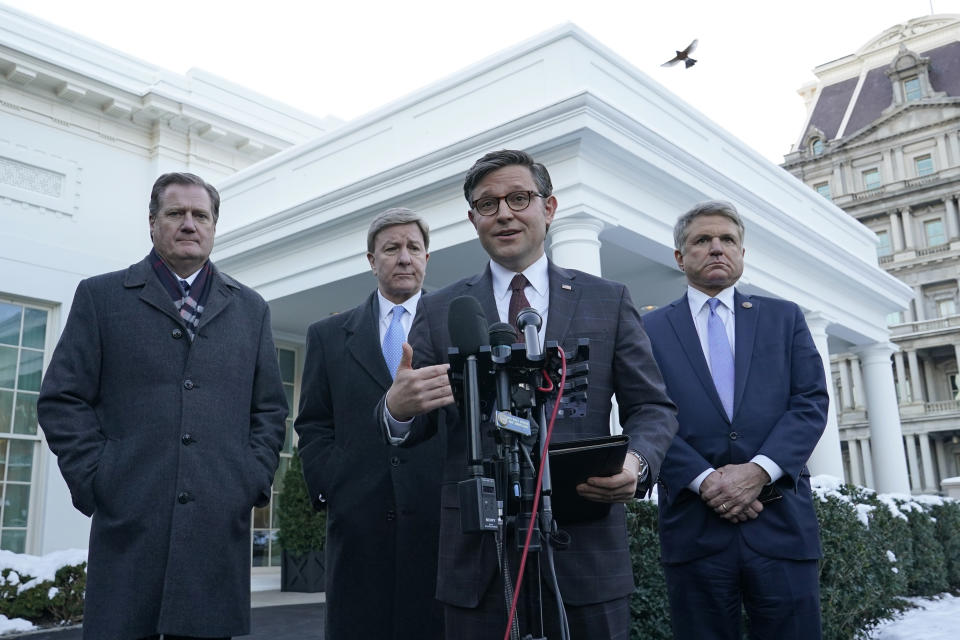 FILE - House Speaker Mike Johnson of La., second from right, flanked by, from left, Rep. Mike Turner, R-Ohio, Rep. Mike Rogers, R-Ala., and Rep. Mike McCaul, R-Texas., speaks to reporters outside the West Wing of the White House in Washington, Jan. 17, 2024, following their meeting with President Joe Biden. A major sticking point in negotiations over border security and Ukraine funding in Congress has been whether the Biden administration should continue to have the authority to allow migrants into the U.S. who would otherwise be turned away. (AP Photo/Susan Walsh, file)