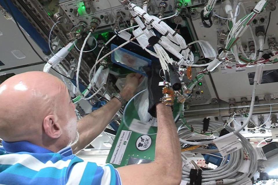 ISS commander Luca Parmitano baking cookies on board the International Space Station (ISS) (PA Media)