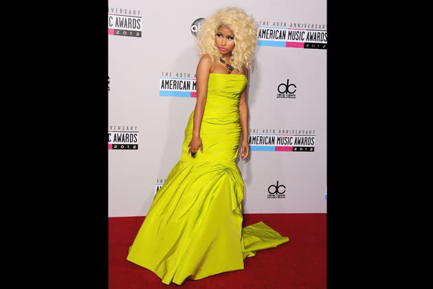 Nicki Minaj goes for a striking yellow dress by Monique Lhuillier for the 40th Anniversary America Music Awards last November 2012.