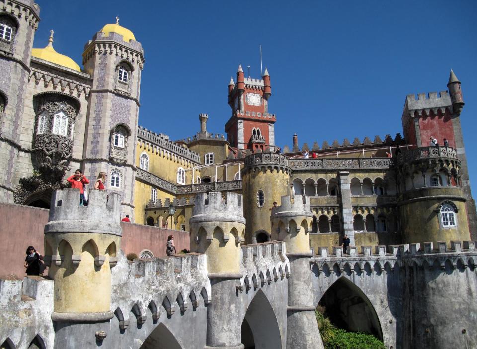 This May 2013 photo shows the exterior of Pena Palace in Sintra, Portugal. It’s like a castle seen through a kaleidoscope, one of a number of spectacular buildings found in Sintra, which has long been a playground of royalty near the Portuguese capital of Lisbon. (AP Photo/Mike Corder)