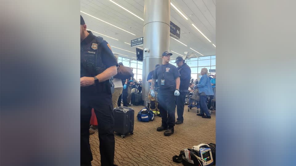 A photo taken by passenger Jaci Purser after the Delta flight she was on returned to the airport due to a cabin pressure issue that caused bloody noses and other problems for passengers. - Jaci Purser