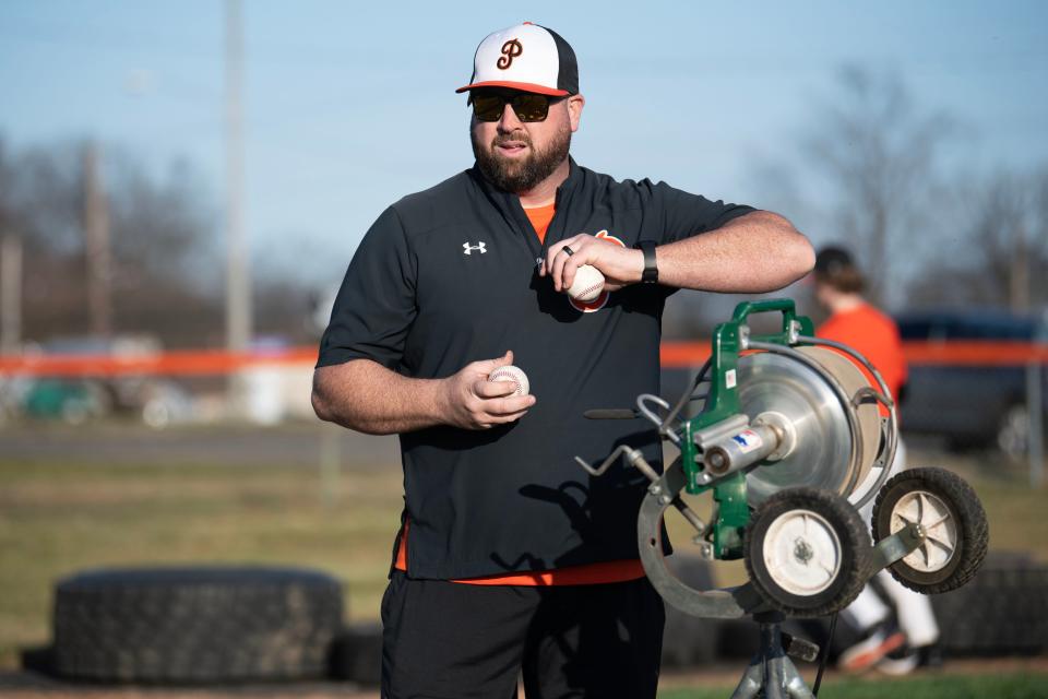 Pennsbury baseball coach Joe Pesci leads a Falcons' spring practice.