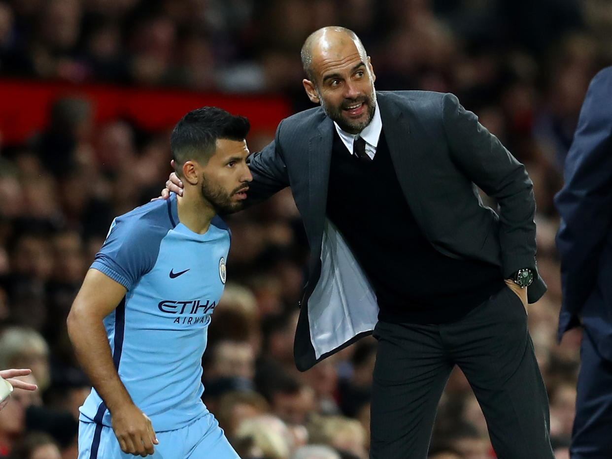 Guardiola was unable to confirm if Aguero signed a new contract last season: Getty