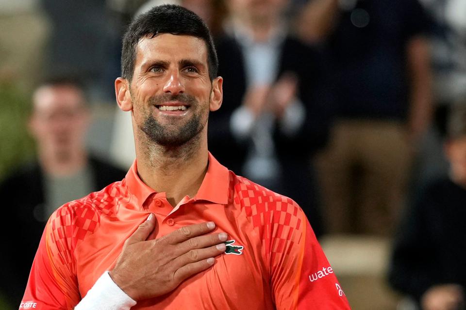 Novak Djokovic smiles after beating Marton Fucsovics (Thibault Camus/AP) (AP)