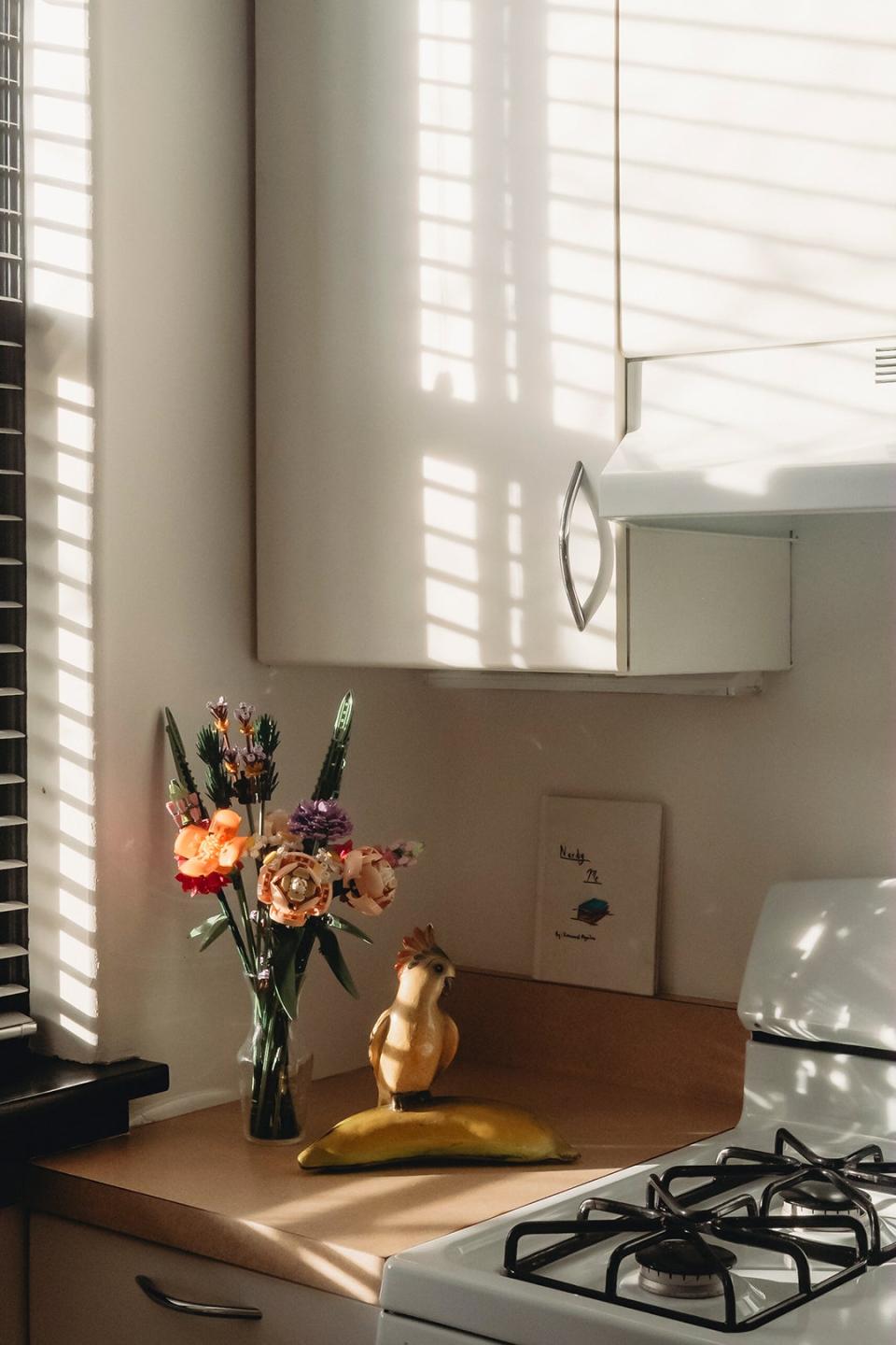 White cabinet corner with flowers