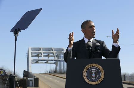 U.S. President Barack Obama delivers remarks at the Edmund Pettus Bridge in Selma, Alabama, March 7, 2015. REUTERS/Jonathan Ernst