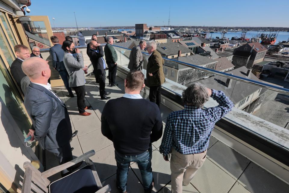 A Danish delegation take in the view from the Harborview Gallery at the Whaling Museum uring their stop in New Bedford for the U.S. East Coast Offshore Wind Roadshow featuring stops in New York City, Stamford and Providence.
(Photo: PETER PEREIRA/FILE The Standard-Times)