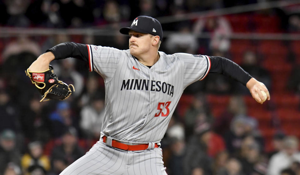 Minnesota Twins pitcher Brent Headrick winds up during the eighth inning of the team's baseball game against the Boston Red Sox at Fenway Park, Wednesday, April 19, 2023, in Boston. (AP Photo/Mark Stockwell)