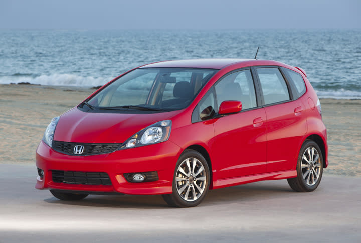 <b>Subcompact: <a href="http://autos.yahoo.com/used-cars/overview;_ylt=AsRouAGSiPCEyd4MFNRACJFXc78F;_ylv=3?listingtype=used&make=honda&model=fit&modelyearlb=2007&modelyearub=2011&askpricelb=any&askpriceub=any&deliverymileagelb=any&deliverymileageub=any&location=" data-ylk="slk:2007-'11 Honda Fit;elm:context_link;itc:0;sec:content-canvas" class="link ">2007-'11 Honda Fit</a></b><br>Previously available in other parts of the world and introduced to the U.S. market in 2007, the Honda Fit has won over editors and consumers with its spirited and nimble driving demeanor, high fuel economy and incredibly space-efficient design. The Fit's unique rear seat can be configured four different ways, including one in which the seat bottom flips up against the backrest, allowing fairly tall items to be carried within the cabin. Folding the seat down flat provides a surprising amount of cargo space: up to 57 cubic feet in the second-generation version (2009+).<br><br>There are but two demerits to a used Honda Fit. One is the noticeable engine noise at highway speeds and the other is the first-generation Fit's lack of a telescoping steering wheel, which could annoy taller drivers. Introduced for the 2009 model year, the second-generation Honda Fit (which we had in our long-term fleet) brought a telescoping steering wheel, more passenger and cargo space, a little more power (117 horsepower versus 109) and the availability of a navigation system.