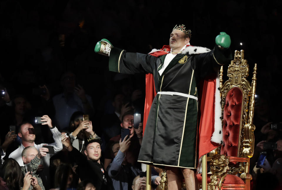 Tyson Fury, of England, arrives in the arena before a WBC heavyweight championship boxing match against Deontay Wilder, Saturday, Feb. 22, 2020, in Las Vegas. (AP Photo/Isaac Brekken)