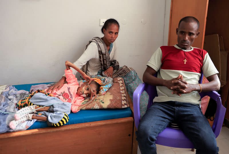 Tsige Sisay, 10, a severely malnourished girl lies on her bed at the Ayder Referral Hospital in Mekele