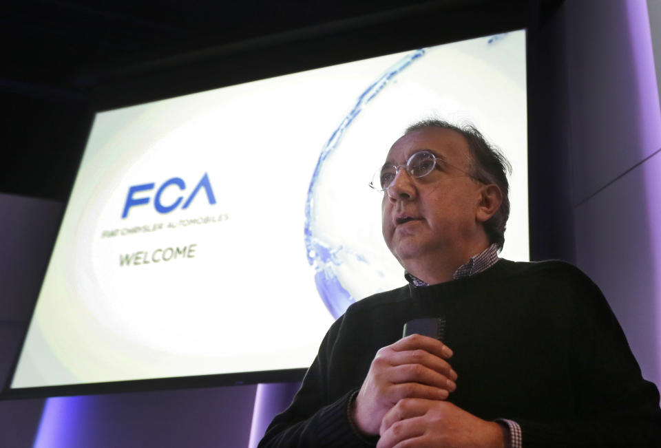 Chrysler Group LLC Chairman and CEO Sergio Marchionne prepares to speak to investors at the automaker's world headquarters in Auburn Hills, Mich., Tuesday, May 6, 2014. Fiat Chrysler Automobiles NV unveiled its business strategy for the next five years as it prepares for life as a newly merged company. (AP Photo/Carlos Osorio)