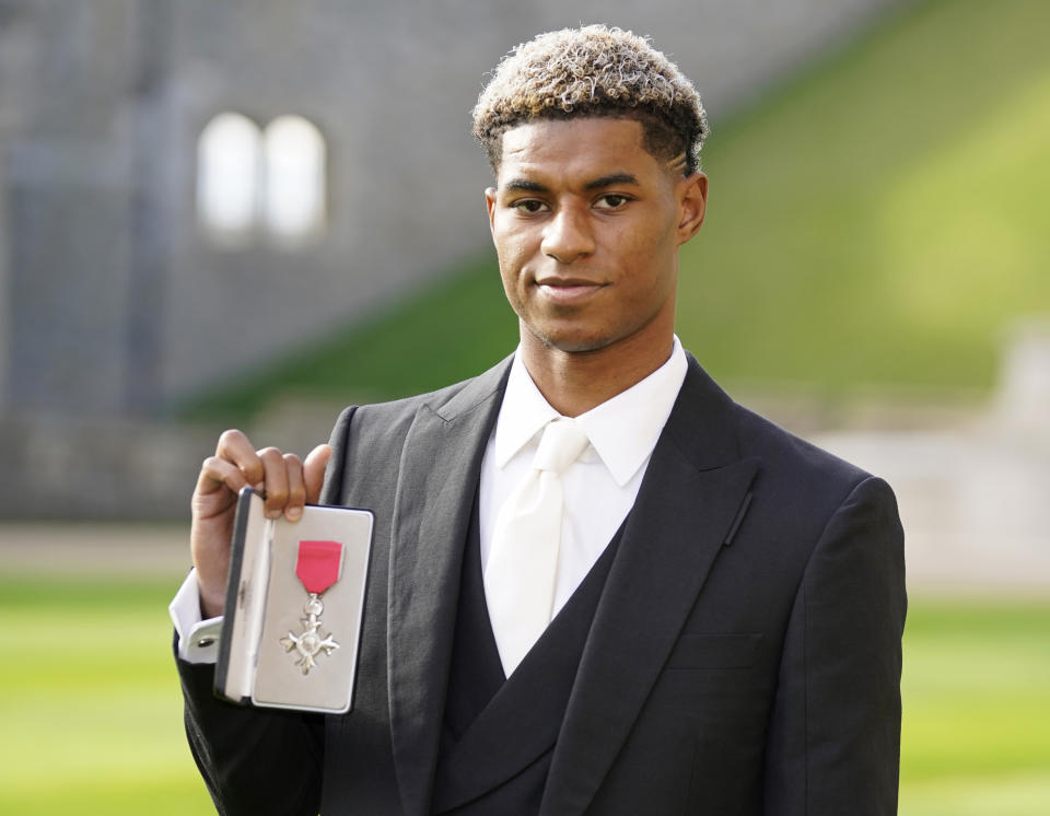 Footballer Marcus Rashford after receiving his MBE for services to Vulnerable Children in the UK during Covid-19 during an investiture ceremony at Windsor Castle. Picture date: Tuesday November 9, 2021.