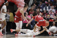 Maryland's Shakira Austin (1) dives for a loose ball against Indiana's Aleksa Gulbe (10) and Jaelynn Penn (13) during the second half of an NCAA college basketball semifinal game at the Big Ten Conference tournament, Saturday, March 7, 2020, in Indianapolis. Maryland won 66-51. (AP Photo/Darron Cummings)