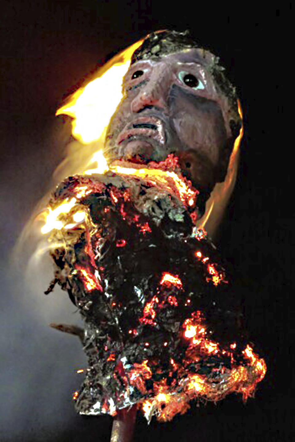 This undated photo, provided by the Flock Theater, shows a burning effigy during the annual burning of Benedict Arnold Festival, in New London, CT., marking the anniversary of the day in September, 1781 that the Connecticut native led British troops into the city and burned most of it to the ground. (Courtesy Flock Theater via AP)