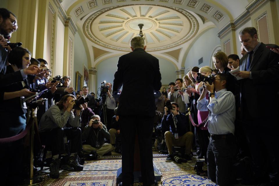 Senate Majority Leader Harry Reid of Nev. speaks during a news conference on Capitol Hill in Washington, Tuesday, Jan. 14, 2014, following a Democratic policy lunch. A massive $1.1 trillion spending bill, aimed at funding the government through October and putting to rest the bitter budget battles of last year, is getting generally positive reviews from House Republicans who are eager to avoid another shutdown crisis with elections looming. (AP Photo/Susan Walsh)