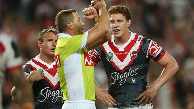 Referee Ben Cummins puts Dylan Napa on report. Image: Getty