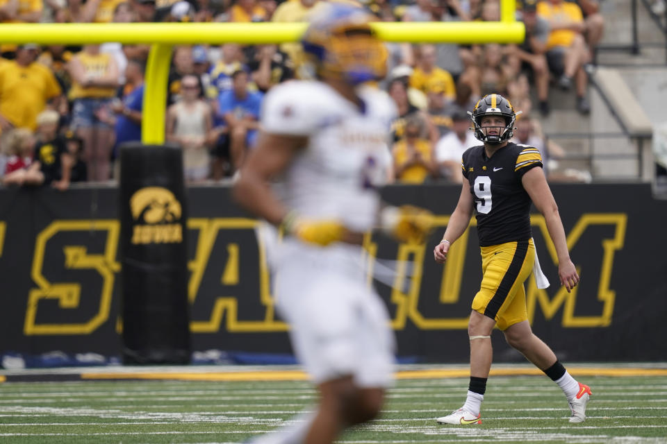 Iowa punter Tory Taylor (9) walks off the field after a punt during the second half of an NCAA college football game against South Dakota State, Saturday, Sept. 3, 2022, in Iowa City, Iowa. Iowa won 7-3. (AP Photo/Charlie Neibergall)