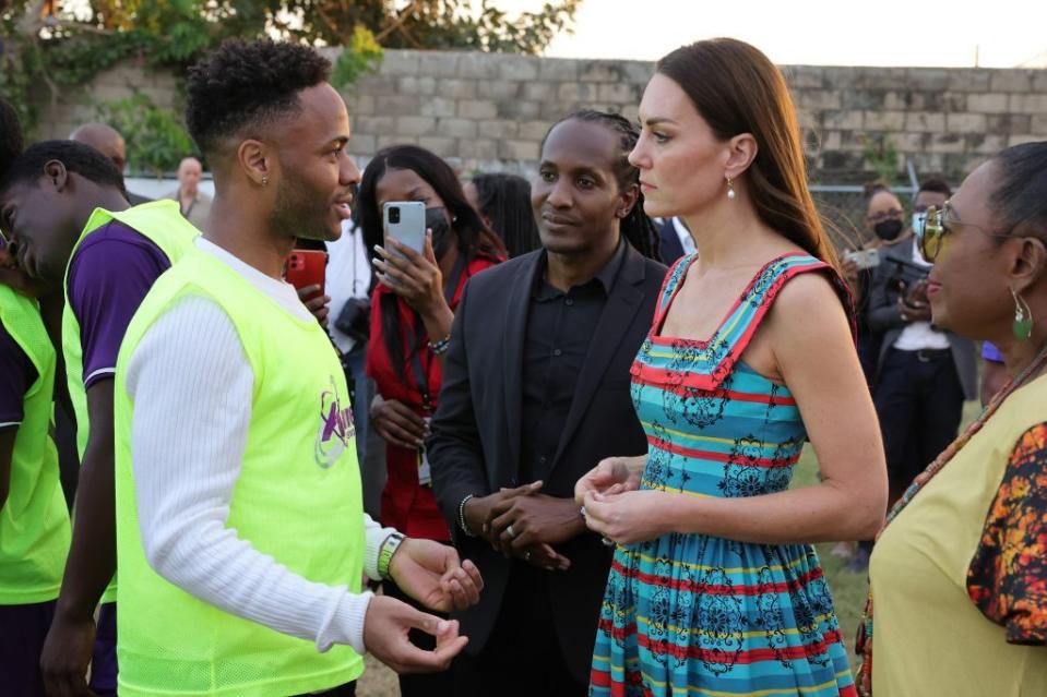 Kate Middleton meets with Premier League star Raheem Sterling at the Trench Town Culture Yard Museum during the Platinum Jubilee Royal Tour of the Caribbean in Jamaica on March 22, 2022. - Credit: Mirrorpix / MEGA