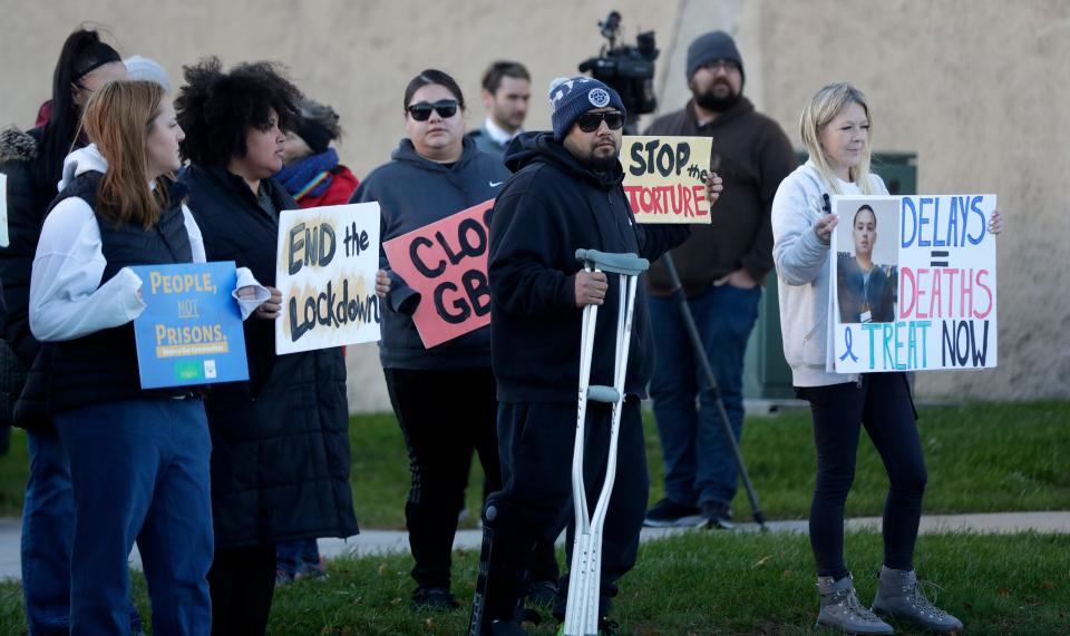 Dozens of people gather outside the Green Bay Correctional Institution on Nov. 9 to call for an end the lockdown and the closure of the 125-year-old facility.
