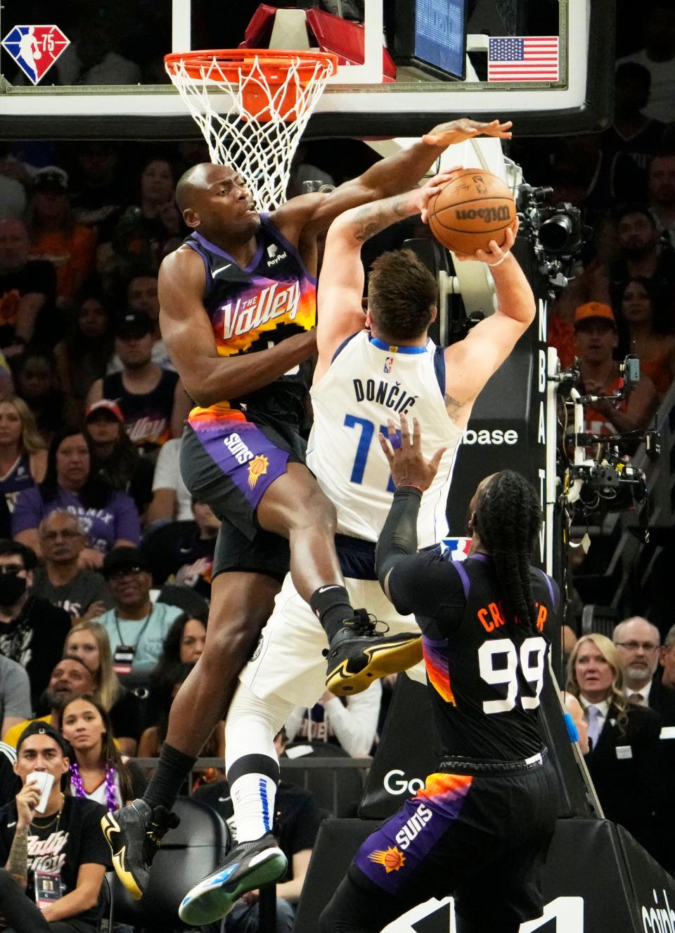 May 15, 2022; Phoenix, Arizona, USA; Phoenix Suns center Bismack Biyombo (18) pressures Dallas Mavericks guard Luka Doncic (77) during game seven of the second round for the 2022 NBA playoffs at Footprint Center.