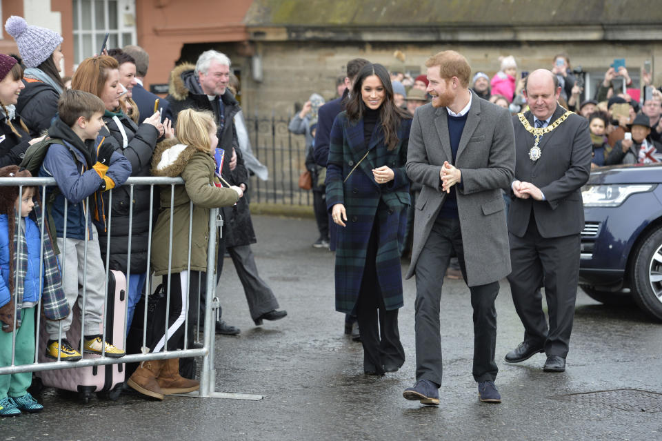 Prince Harry and Meghan Markle during a walkabout on the esplanade at Edinburgh Castle, during their visit to Scotland. (Photo by John Linton/PA Images via Getty Images)