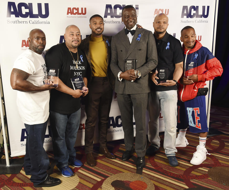 Presenter Michael B. Jordan, third from left, poses with, from left, honorees Antron McCray, Raymond Santana, Yusef Salaam, Kevin Richardson and Korey Wise at the ACLU SoCal's 25th Annual Luncheon at the JW Marriott at LA Live, Friday, June 7, 2019, in Los Angeles. (Photo by Chris Pizzello/Invision/AP)
