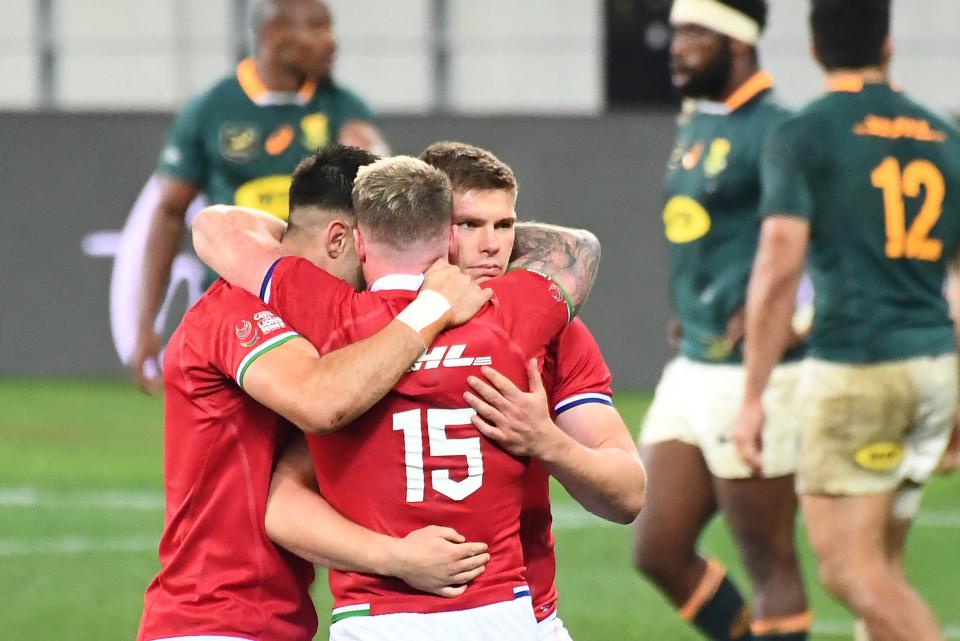 The Lions celebrate their dramatic First Test win over South Africa in Cape Town (AFP via Getty Images)