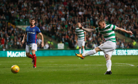Soccer Football - Celtic vs Linfield - UEFA Champions League Second Qualifying Round Second Leg - Glasgow, Britain - July 19, 2017 Celtic's Jonny Hayes shoots at goal REUTERS/Russell Cheyne