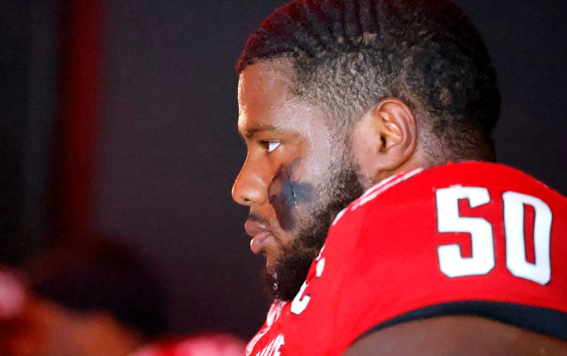 N.C. State center Grant Gibson (50) waits to head out onto the field to warmup before N.C. State’s game against Wake Forest at Carter-Finley Stadium in Raleigh, N.C., Saturday, Nov. 5, 2022.