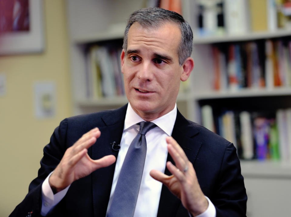 FILE - In this Aug. 16, 2018 file photo Los Angeles Mayor Eric Garcetti talks during an interview about homelessness in Los Angeles. Members of the Trump administration are visiting Los Angeles to get a firsthand look at the city's sprawling homeless encampments, while President Donald Trump has directed his staff to develop policy options to address the national crisis of people living on the streets. Garcetti issued an invitation for the president to walk the streets with him and see the suffering and squalid conditions. (AP Photo/Richard Vogel,File)