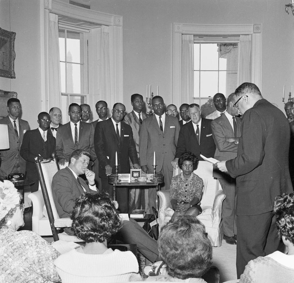 Handout photo of then U.S. President Kennedy with representatives from NAACP in Oval Office at the White House, Washington