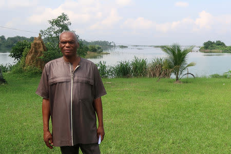 Chief Michael Porobunu, chairman of Gokana council of chiefs, stands outside his house in the village of Bodo in the Niger delta where two oil spills took place in 2008, Nigeria August 2, 2018. REUTERS/Ron Bousso