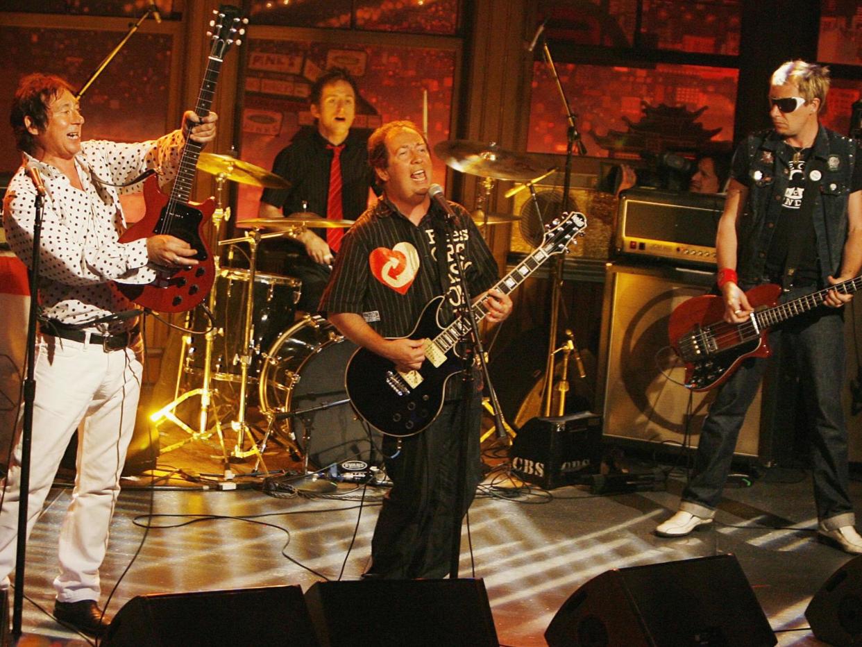 Shelley (centre) and fellow Buzzcocks performing on The Late Late Show in June 2006: Getty