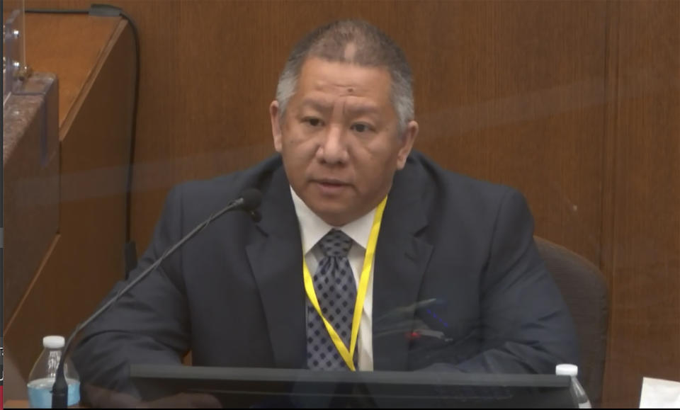 In this image from video, Minneapolis Police Crisis Intervention Coordinator Ker Yang testifies as Hennepin County Judge Peter Cahill presides Tuesday, April 6, 2021, in the trial of former Minneapolis police Officer Derek Chauvin at the Hennepin County Courthouse in Minneapolis, Minn. Chauvin is charged in the May 25, 2020 death of George Floyd. (Court TV via AP, Pool)