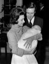 Princess Margaret and former husband Lord Snowdon posed for photographs outside of Clarence House with their first child on November 30, 1961. [Photo: Getty]