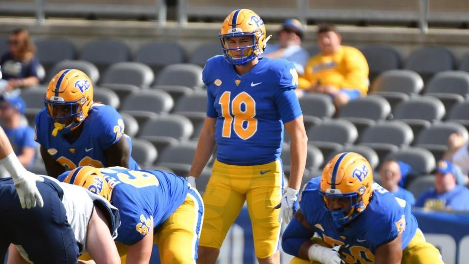 Pitt quarterback Eli Kosanovich looks out over the line of scrimmage when he played briefly in a game in 2021 against New Hampshire