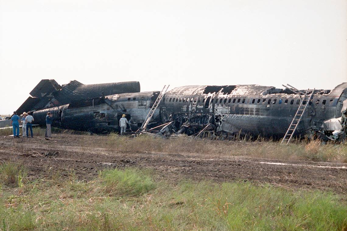 Aug. 31, 1988: The rear of the Boeing 727, to the left in this photo, sustained the most damage during the crash of Delta 1141 during takeoff at Dallas-Fort Worth International Airport. Most of the fuselage burned during the subsequent fire.