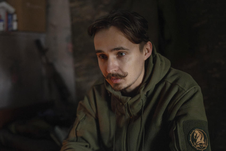 The serviceman of 47th brigade known by call-sign "Azimuth", 33, speaks, during an interview with The Associated Press, in Donetsk region, Ukraine, on Thursday, Feb. 29, 2024. The loss of the city of Avdiivka last month marked the end of a long, exhausting defense for the Ukrainian military. One brigade had defended the same block of buildings for months without a break. (AP Photo/Alex Babenko)