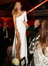 After last Sunday's Golden Globes, Heidi Klum really let loose, making her way atop a table at The Weinstein Company's afterparty. Though Klum was snapped munching on fries brought in from fast-food chain Fatburger, the guests got some gourmet grub too cooked up by caterer-to-the-stars Helene An – including garlic noodles, Dover sole in ginger-miso sauce, and “Dragon Breath” cookies, named after Weinstein himself, who was born in the year of the dragon. But it looked like Heidi wasn't exactly in a position to eat! (1/13/2013)