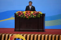 Chinese President Xi Jinping delivers his opening speech on stage for the Belt and Road Forum at the Great Hall of the People in Beijing, Wednesday, Oct. 18, 2023. (AP Photo/Ng Han Guan)