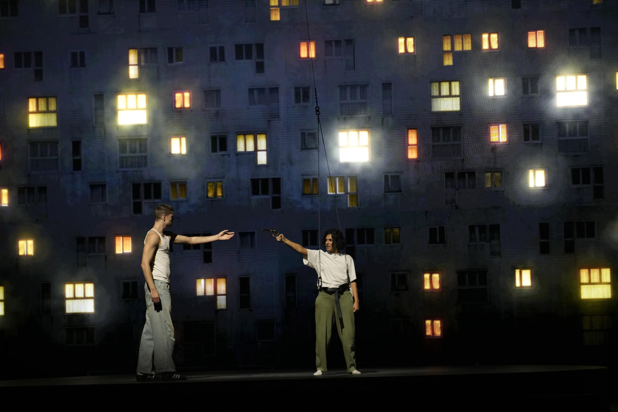 Actors perform during a rehearsal of La Haine musical show, in Tremblay en France, Tuesday, Sept. 17, 2024. (AP Photo/Christophe Ena)