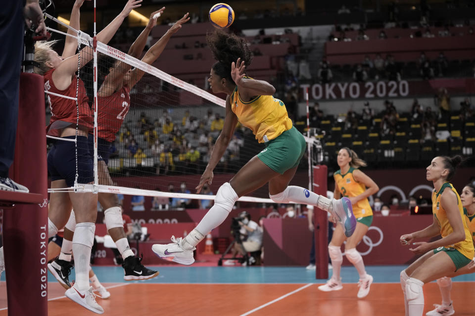 Brazil's Fernanda Rodrigues spikes against the United States during the gold medal match in women's volleyball at the 2020 Summer Olympics, Sunday, Aug. 8, 2021, in Tokyo, Japan. (AP Photo/Manu Fernandez)