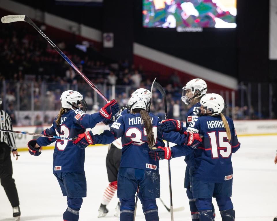 Team USA celebrates after scoring in a 10-0 quarterfinal victory over Japan at the Adirondack Bank Center Thursday.