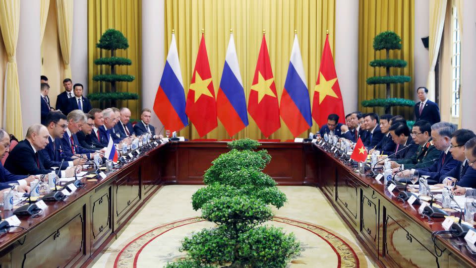 Russian President Vladimir Putin and his Vietnamese counterpart To Lam attend a meeting at the Presidential Palace in Hanoi on June 20, 2024. - Minh Hoang/Pool/Reuters