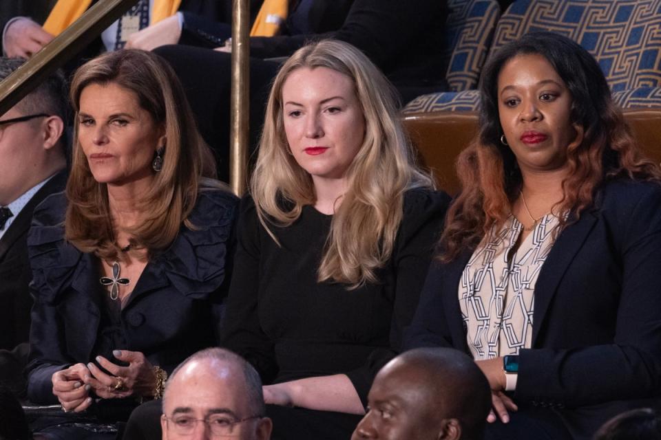 Women’s health advocate Maria Shriver (L); Texas mother of two who fought a legal battle after being denied an abortion, Kate Cox (C); and Latorya Beasley (R) of Alabama whose embryo transfer was canceled as a result of the recent Alabama Supreme Court decision; sit in the House chamber before US President Joe Biden delivers his State of the Union address before a joint session of Congress on the floor of the US House of Representatives, on Capitol Hill (EPA)