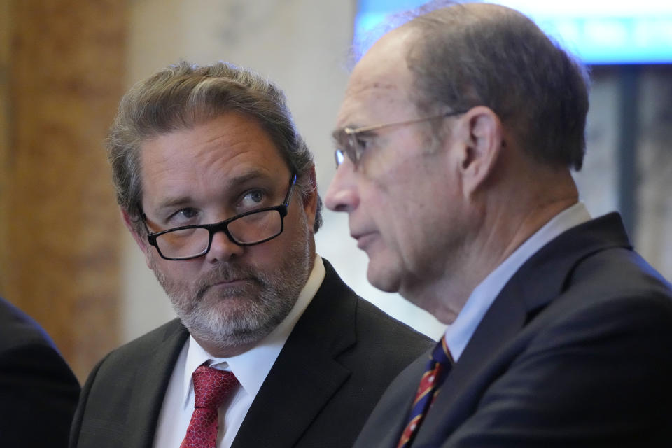 Mississippi Republican Lt. Gov. Delbert Hosemann, right, confers with State Sen. Scott DeLano, R-Biloxi, in the Senate Chamber, at the Mississippi State Capitol in Jackson, Tuesday, April 30, 2024. (AP Photo/Rogelio V. Solis)